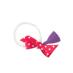 Pulsera de perlas Swarosvky, lazo rojo y pompón morado (col. Med.) de Mara García
