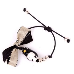 Pulsera pingüino y lazo de Mara García